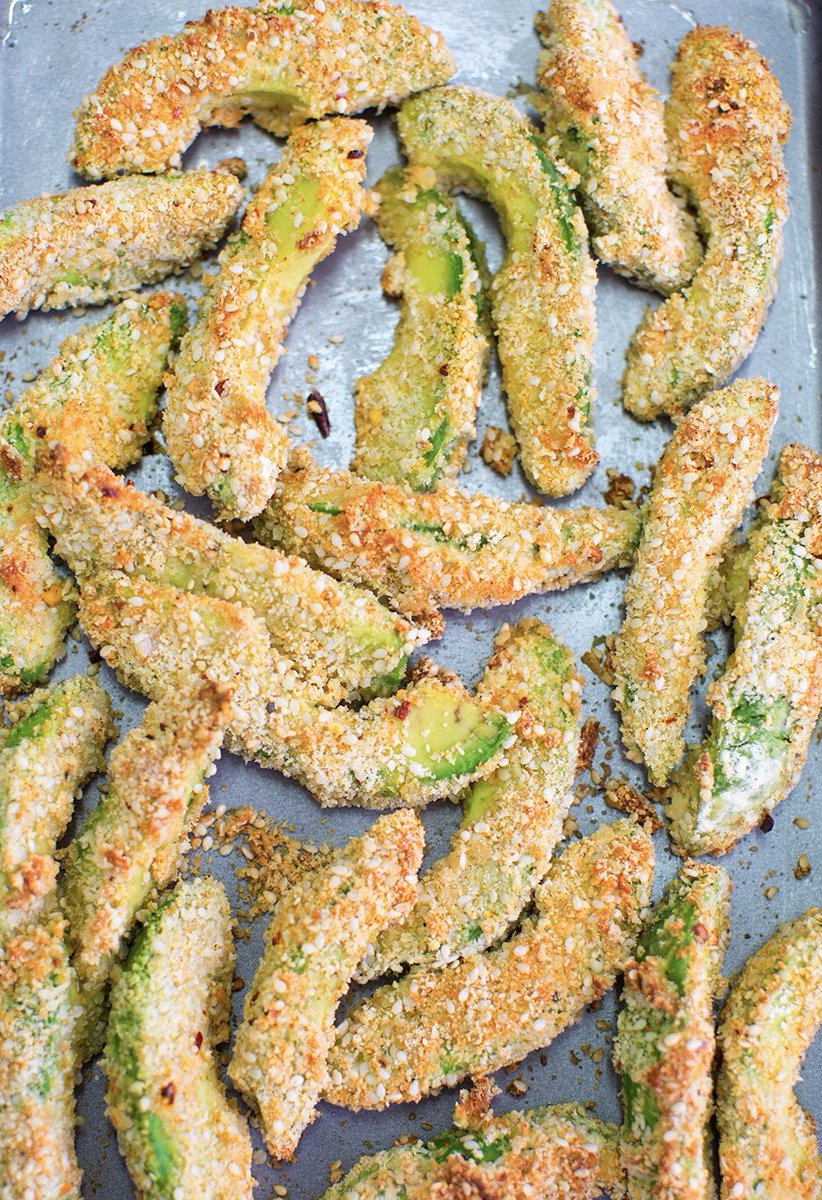 DeliciouslyElla's tweet photo. Anyone tried baked avocado fries yet? Creamy slices of avo coated with almonds, chickpea flour, sesame seeds, paprika, cayenne &amp; chilli 😍 https://t.co/A1FFJzSQ9k