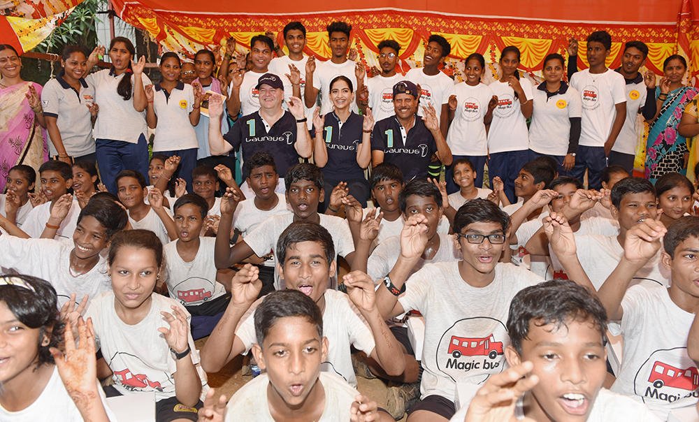 IWC's tweet photo. .@therealkapildev and @sonamakapoor 
inspire young people at @MagicBusIndia, one of the @LaureusSport supported project #IWCLaureus https://t.co/he1XRng9hQ