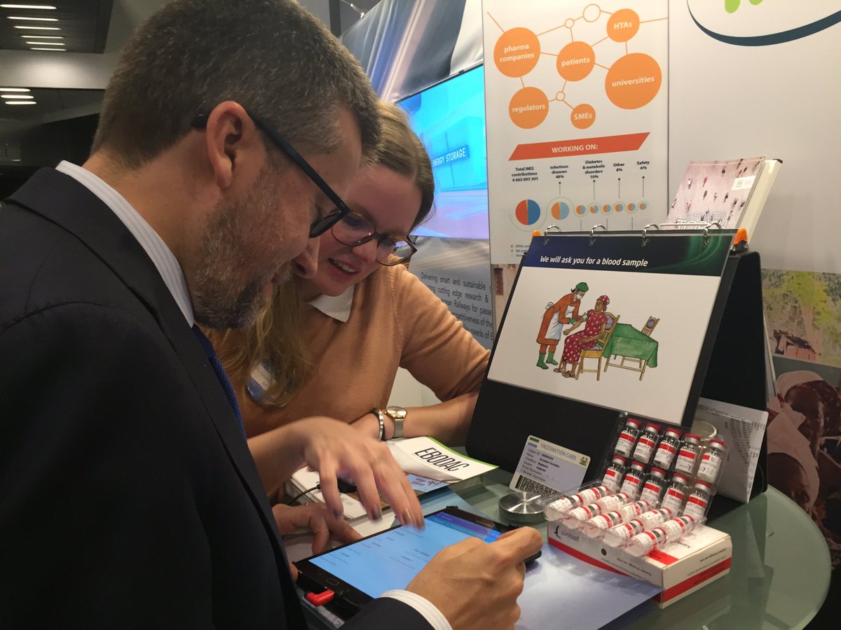 IHIEurope's tweet photo. Commissioner @Moedas gets the Sierra Leone #Ebola vaccine trial experience with an iris scan at #JUs4Innovation https://t.co/3EGgX17yVC