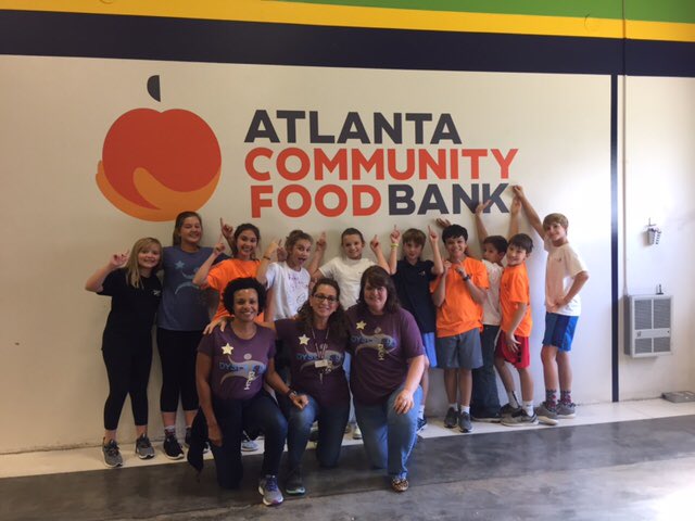 Schenck6th's tweet photo. 6th Graders serving our community at the Atlanta Community Food Bank.  We packed 12,205 pounds of food 
= 8,712 meals!@SchenckSchool https://t.co/gloaGnQJxv
