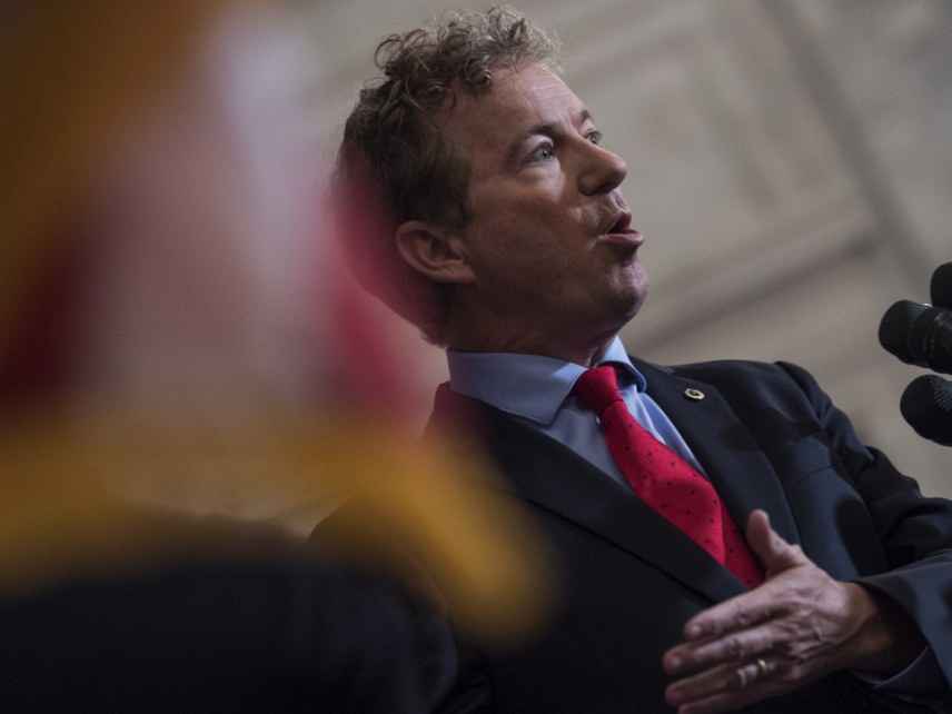 All Republicans stand and applaud Flake's tantrum, except Rand Paul