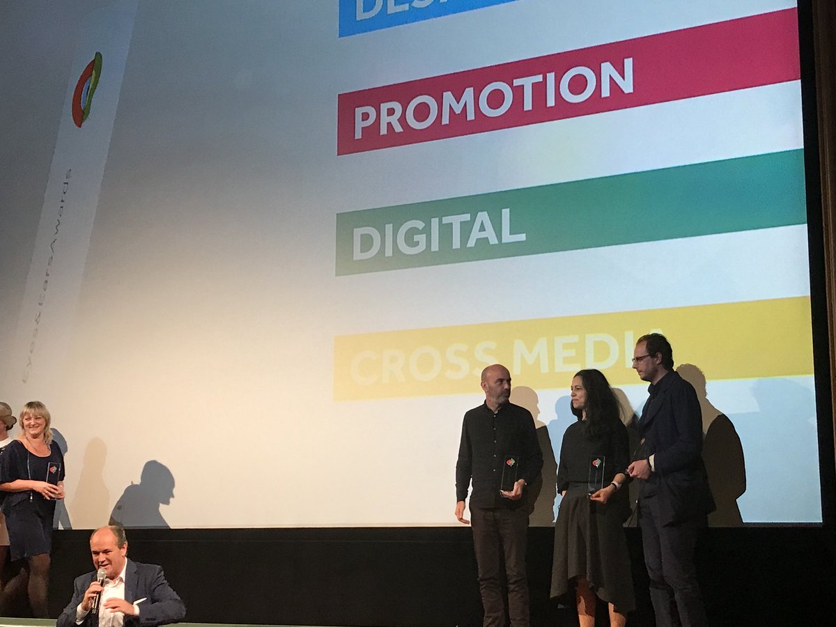 On stage collecting the Design category trophies on behalf of our great team in London and <a href="/the_partners/">The Partners</a> #eeofeawards2017