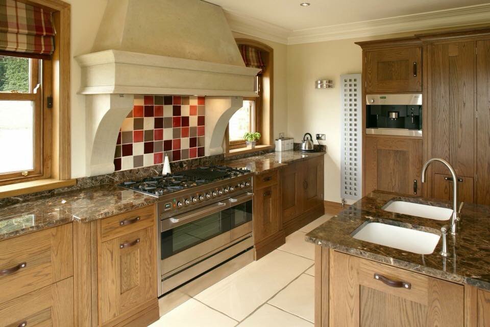 Solid oak kitchen with, sandstone corbels.
