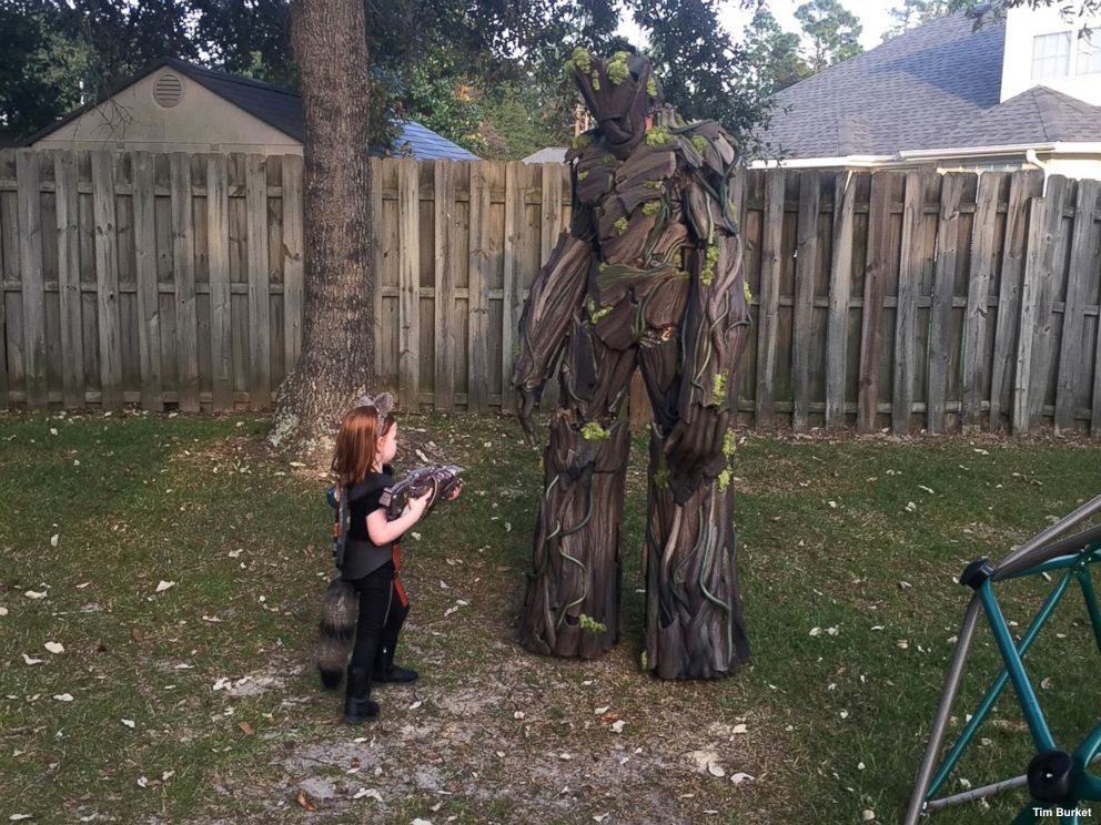 GMA's tweet photo. Dad builds 7-foot Groot costume to accompany his “Guardians of the Galaxy”-obsessed 3-year-old trick-or-treating. https://t.co/WeXCMkmfDG https://t.co/xyaRbcV91V