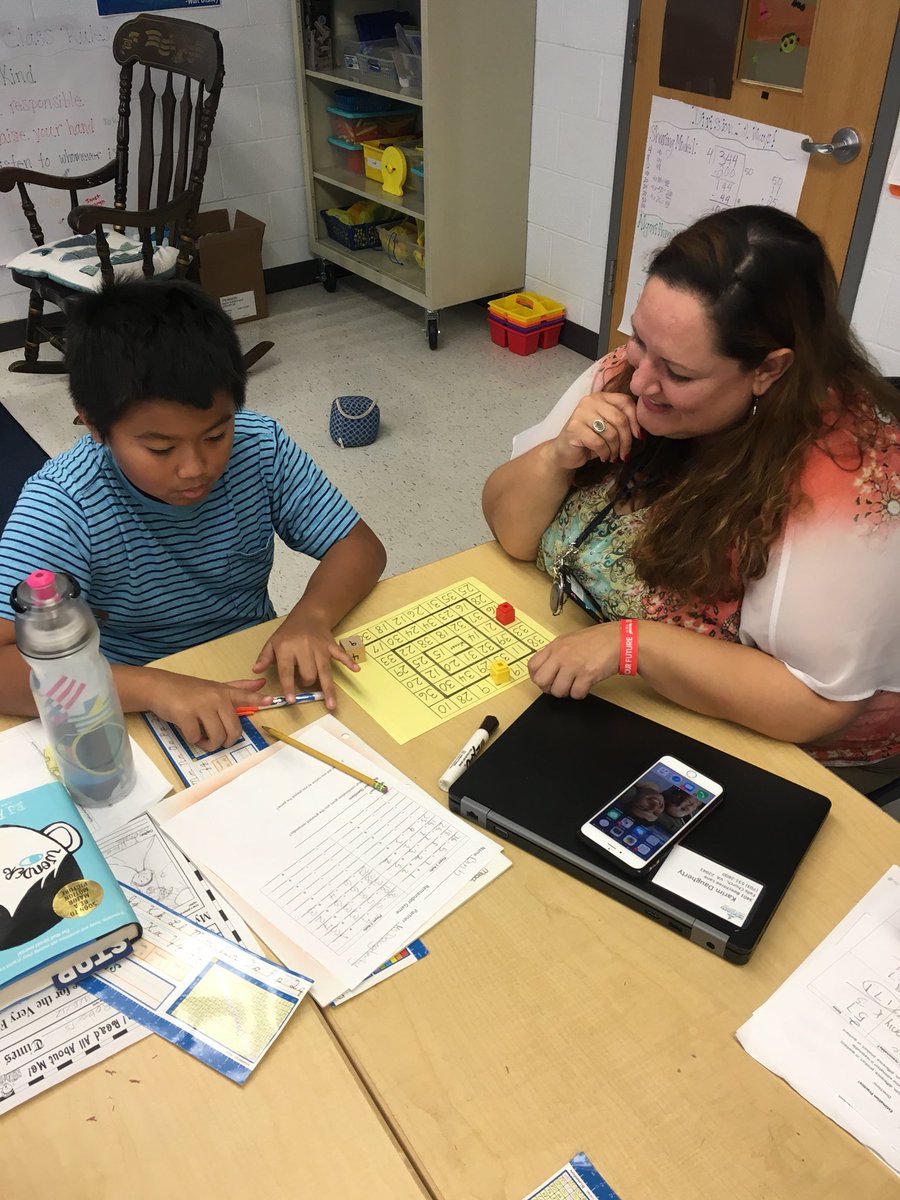 SarahBoudart's tweet photo. LOVE seeing my administrators working with kids in the classroom!!! #mathgamesrule @KDaugherty29 https://t.co/KeSYfLTUrv