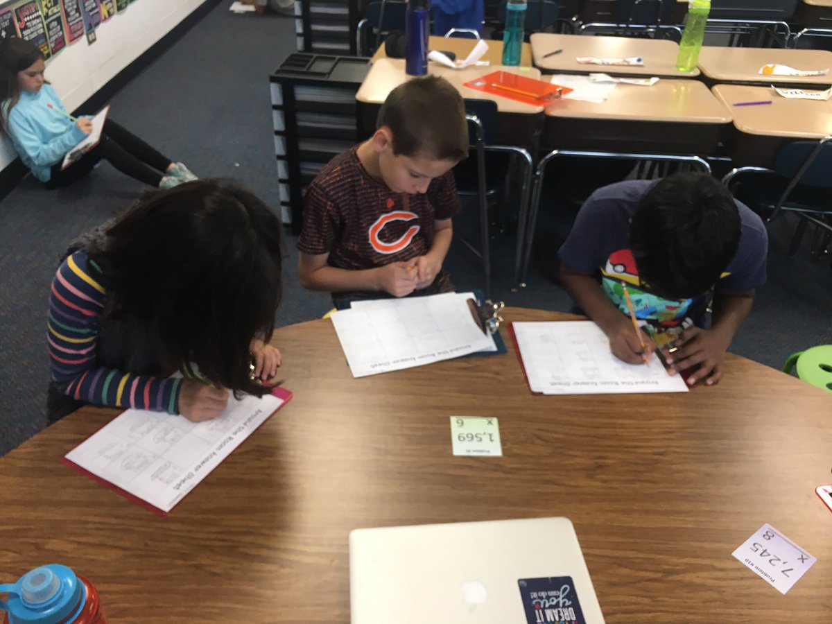 MrsFoxLPS's tweet photo. Look at these rockstars showing what they know with 4 digit multiplication! #taskcardfun #IvyHillLeague https://t.co/Qg2C3BsL6X