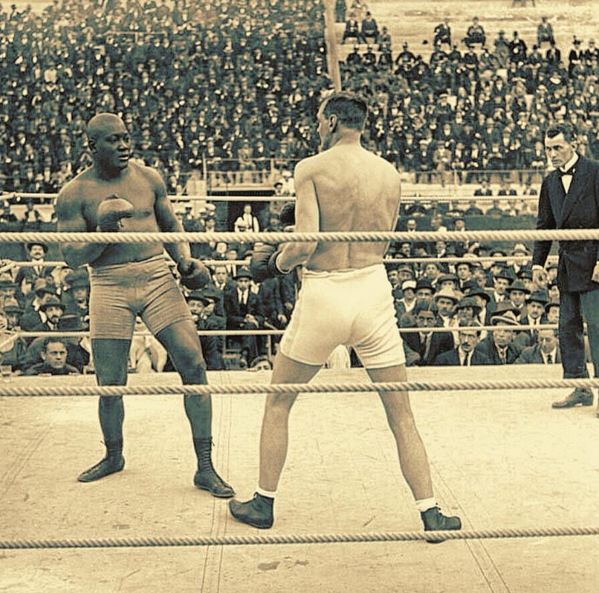A photo of heavyweight Jack Johnson baiting in Arthur Craven in 1916. #GalvestonGiant #BoxingHistory