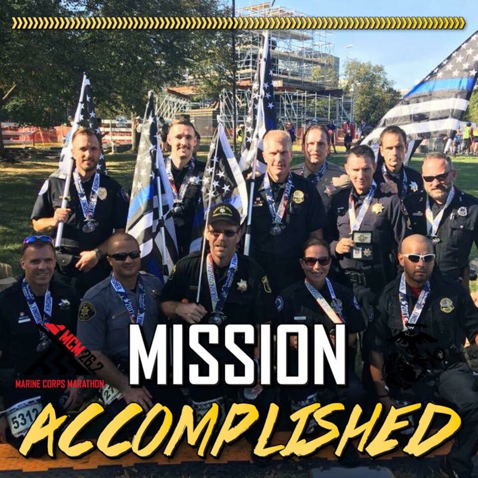 Policemankeegan's tweet photo. 12 Officers from around the US, ran the #marinecorpsmarathon in full uniform in honor of fallen officers #projectremember https://t.co/VXyHRw74EZ