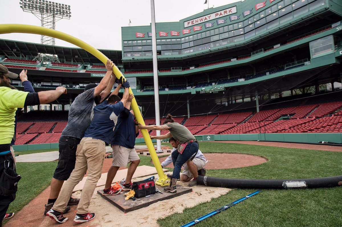 fenwaypark's tweet photo. #FenwayPark is transforming into a football field, one goal post at a time! https://t.co/B3qIcWfepv
