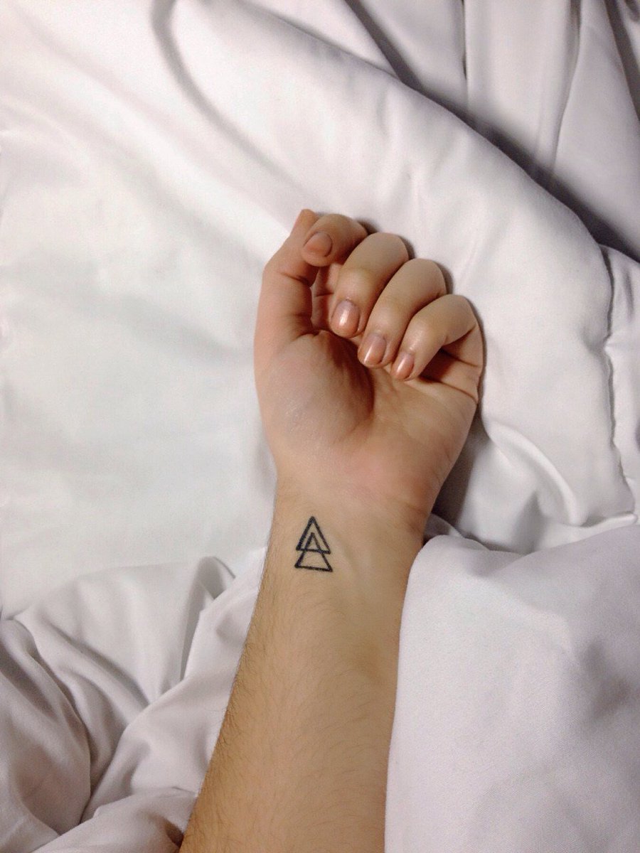 tattooideas__'s tweet photo. Smbol for silver in alchemy tattoo #WristTattoos https://t.co/GivDIRavrY https://t.co/7CXMW4paRe