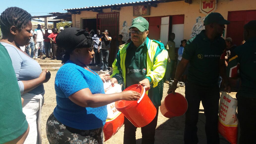 GiftoftheGivers's tweet image. @GiftoftheGivers distributes 100 @Shoprite_SA Food Buckets and Mealie Meal to the flood affected families in Zandspruit. #GautengStorms