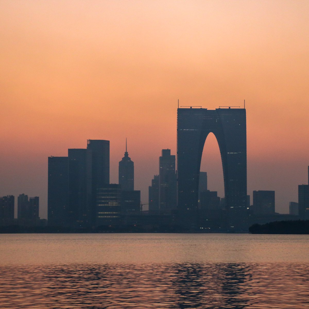 FurtherPursuit's tweet photo. Suzhou's sunset skyline. #ThePhotoHour #Suzhou #China https://t.co/iPVlhEr1Sc