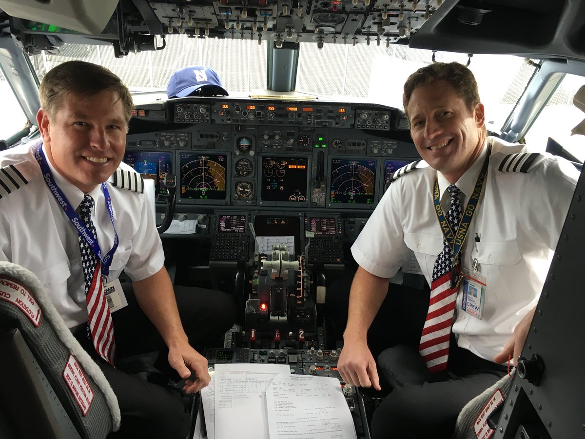 NavyAthletics's tweet photo. Former #NavyFootball players Ben Fay ‘97 and Chad Holzapfel ‘97 are piloting the Navy FB charter to Memphis today.  Go Navy, Beat Memphis! https://t.co/SsKaFpZI1c