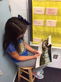 MrsBazzoni's tweet photo. Dayana enjoying a history book.  #readitglobal https://t.co/Bvc33dlE4o