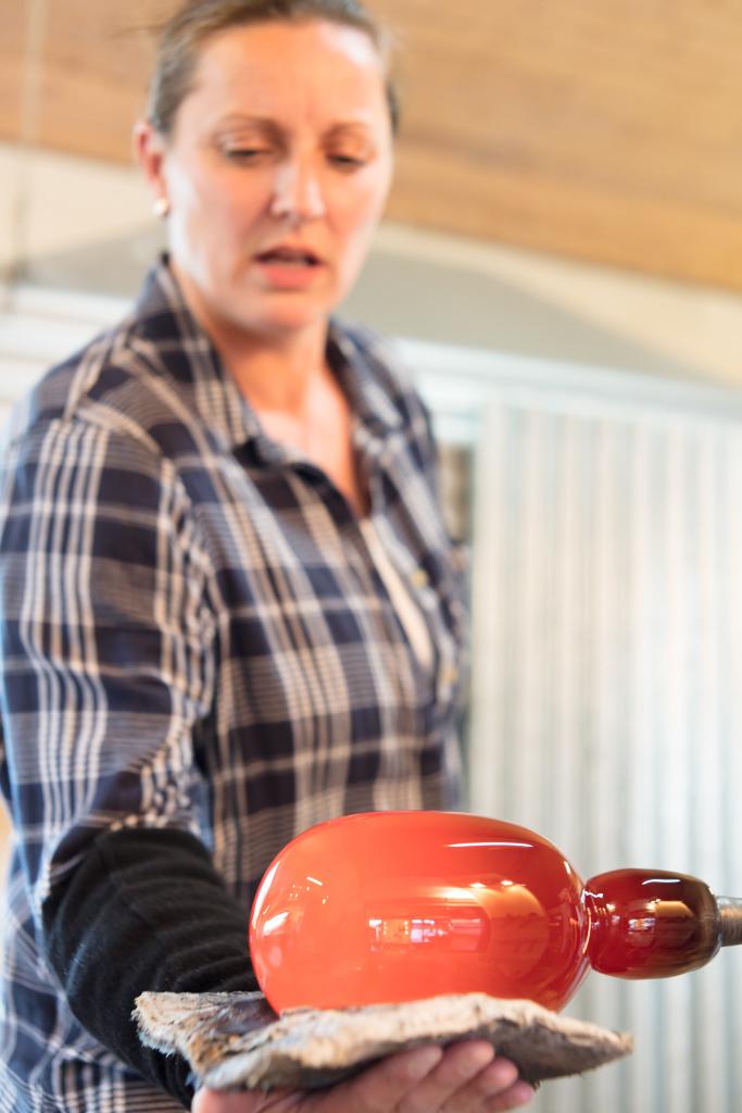 eirianglass's tweet photo. Kim shaping the hot glass by hand and paper, the start of a beautiful ✋blown vase #glassblowing #courses #hayonwye https://t.co/gEROC1FUnt