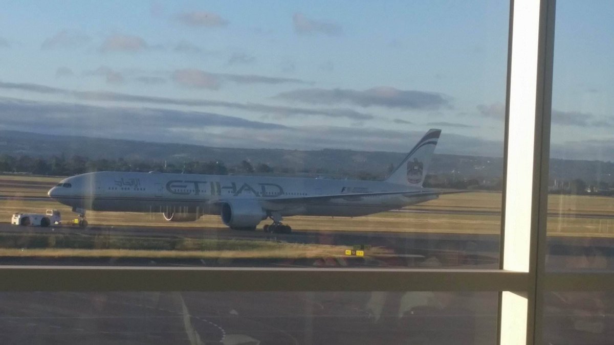 DeejayDenz92's tweet photo. #EY450 being taxied away in Adelaide photo sent via a passenger on board. https://t.co/VrNfbhmUsL