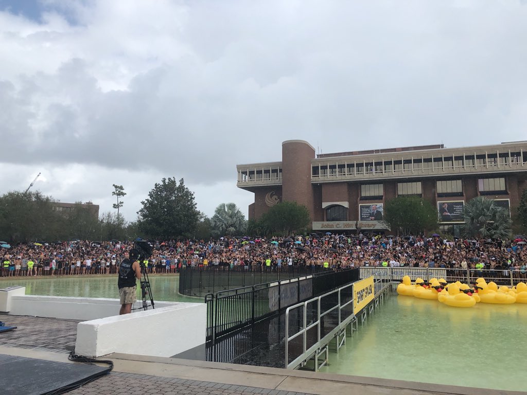 UCF's tweet photo. Gonna get wet anyways 🤷♀️
Thanks for the rain to cool us down, Florida!
#SpiritSplash17 https://t.co/brob6rbPcm