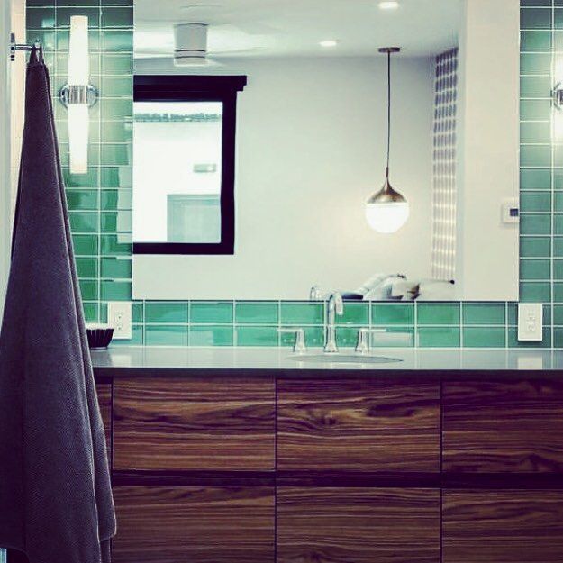 Love this bathroom with our Lush 3x6 Peacock colored glass subway tile!