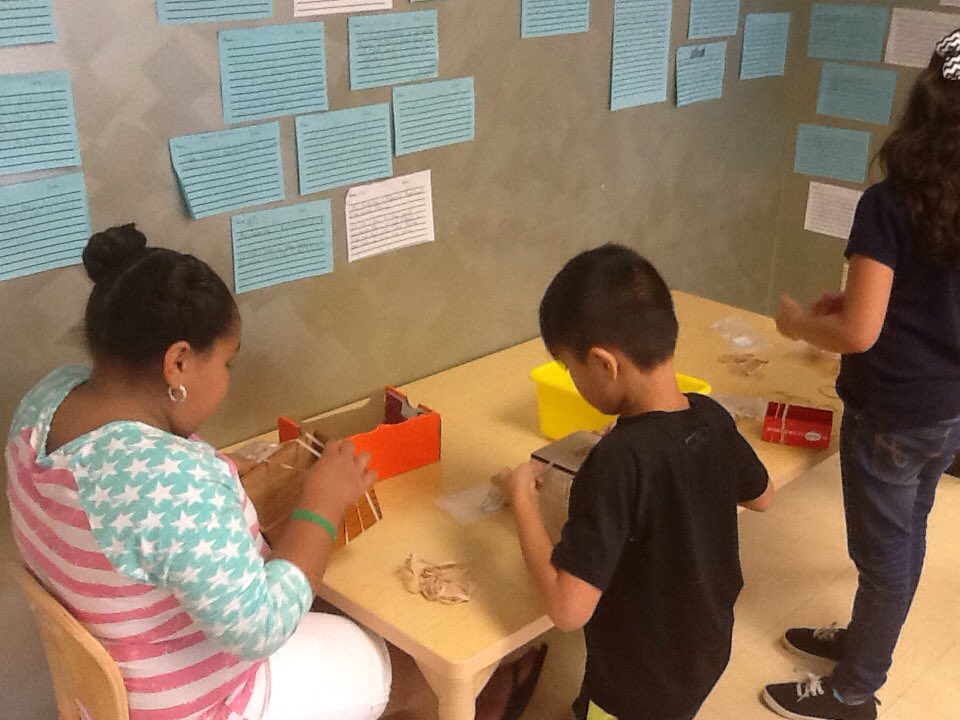 aaee_specials's tweet photo. #aae3rd graders work in groups, experimenting with different materials to make the best sounding "box." https://t.co/CPMx9udjii