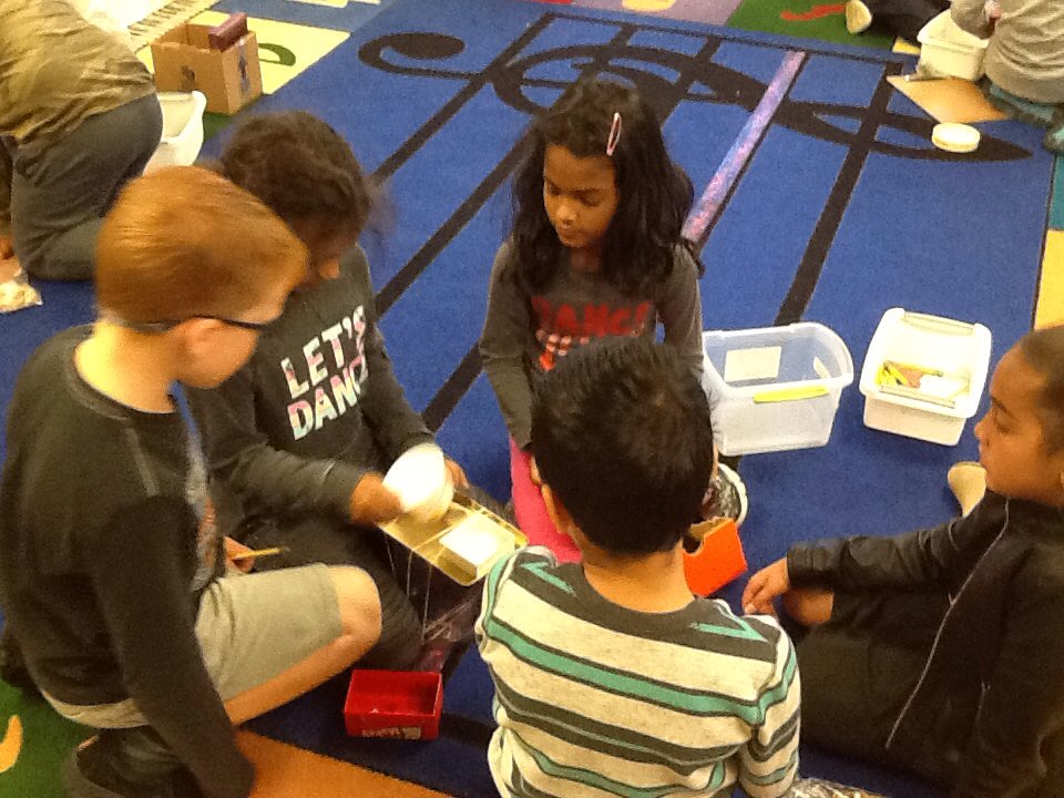 aaee_specials's tweet photo. #aae3rd graders work in groups, experimenting with different materials to make the best sounding "box." https://t.co/nzG3ej8fXu