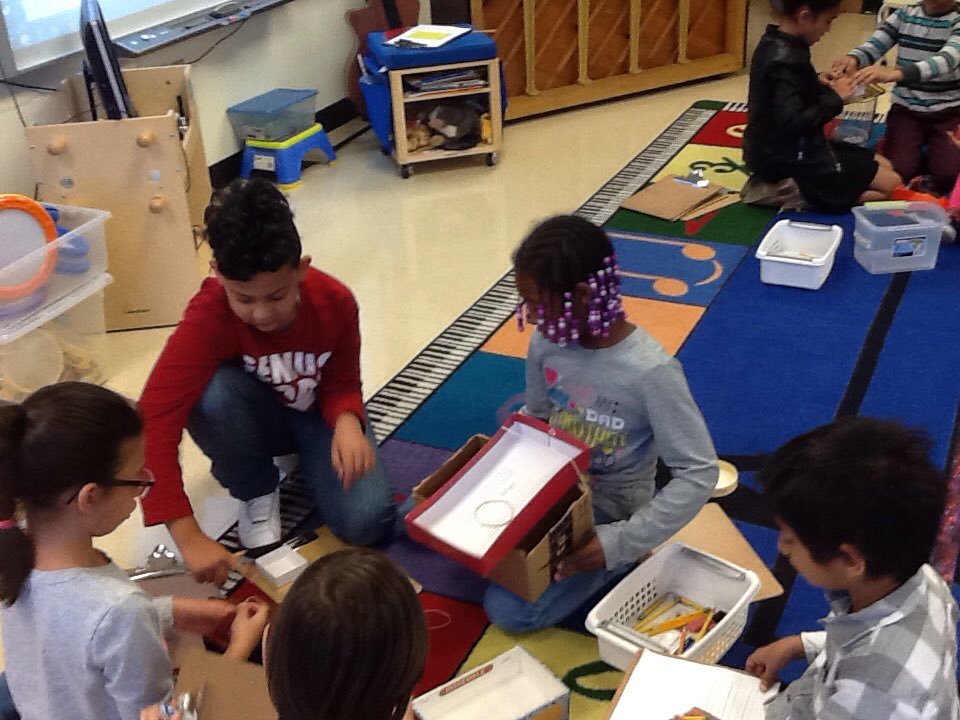 aaee_specials's tweet photo. #aae3rd graders work in groups, experimenting with different materials to make the best sounding "box." https://t.co/nzG3ej8fXu