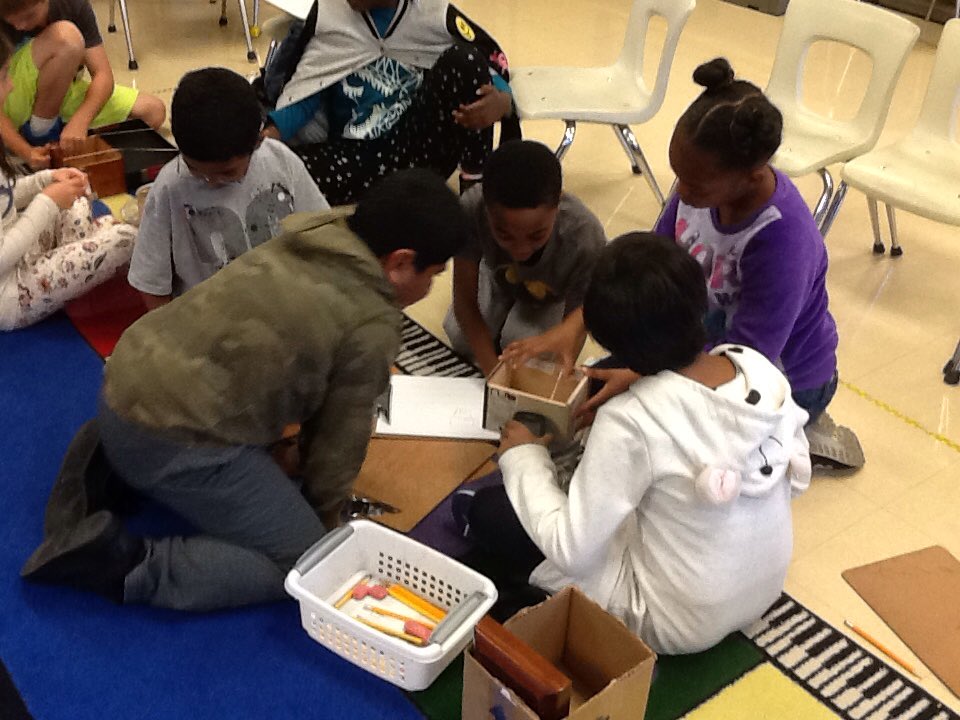 aaee_specials's tweet photo. #aae3rd graders work in groups, experimenting with different materials to make the best sounding "box." https://t.co/nzG3ej8fXu
