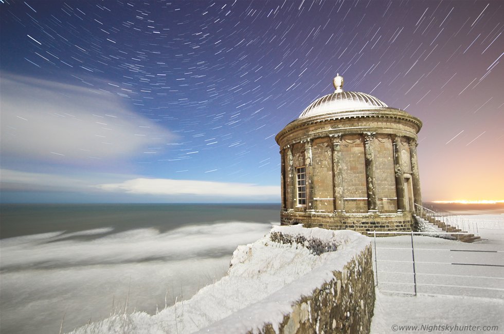 martinastro2005's tweet photo. Moonlit snow &amp; Mussenden Temple with star trail - prints &amp; canvas available https://t.co/19Wt2BjIl1 https://t.co/v7fYndktOz