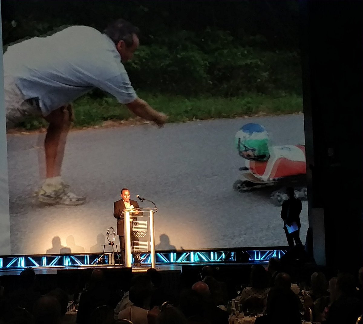 USA_Luge's tweet photo. On stage: #USALuge’s Fred Zimny receives @TeamUSA #RingsofGold award tonight for his work with @WhiteCastle Slider Search over past 30 yrs. https://t.co/Xbsx4E0TFw