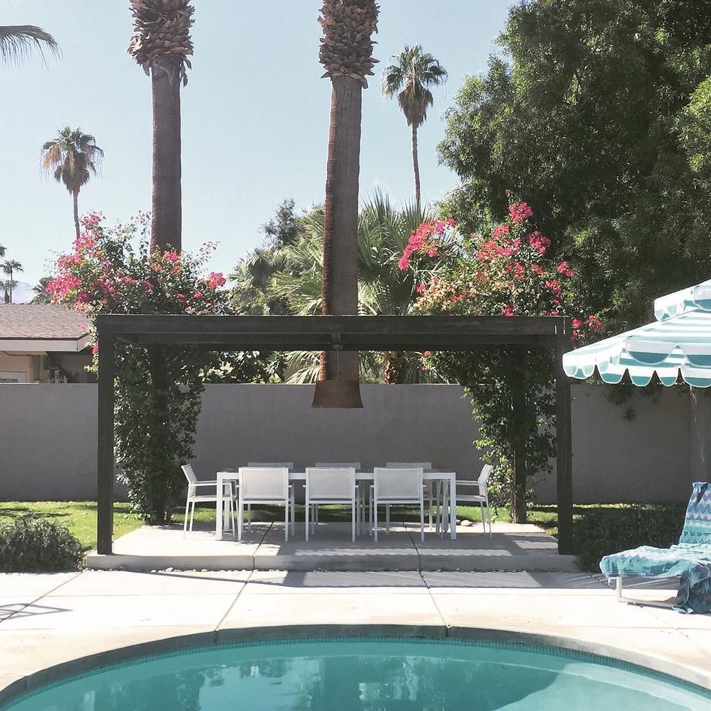 DecorPad's tweet photo. No itty, bitty pergola here. Love the scale and climbing flowering vines of this pergola matched with sleek white … https://t.co/huqfzIRwLf https://t.co/iGvKwh5SXQ
