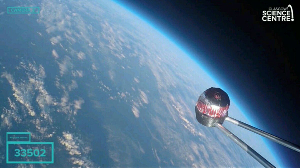 Russell_Kain's tweet photo. @ProfBrianCox @gsc1 A weather balloon and a @TunnockOfficial teacake prove the Earth is NOT flat! Is someone going to eat it? https://t.co/Y1O9QqQ30v