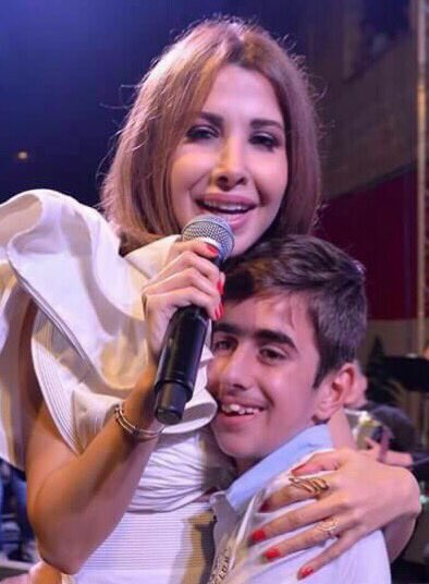 A young Malaysian man loves his Lebanese star #NancyAjram 
Draw this beautiful picture
<a href="/NancyAjram/">Nancy Ajram</a>