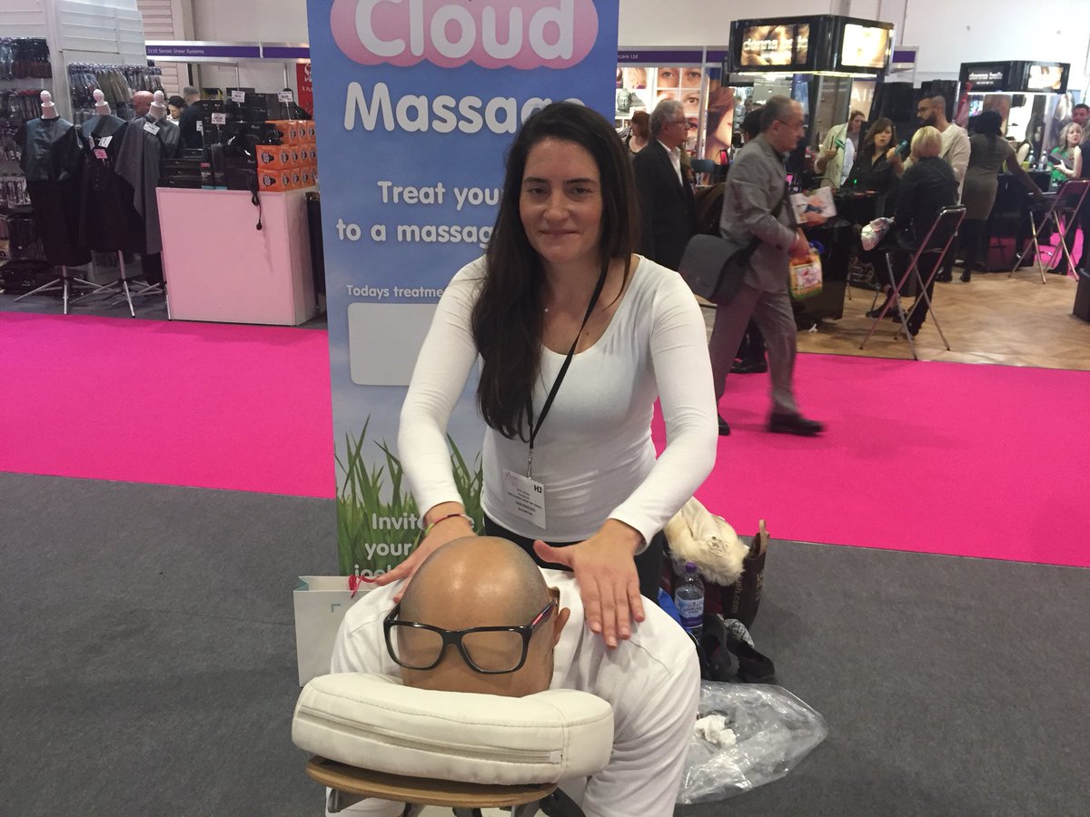 Katy Noad working really hard and support massage at Salon International