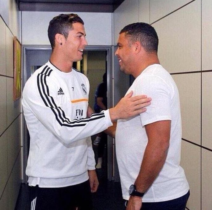 Here's a picture of Ronaldo touching Ronaldo while Ronaldo is smiling at Ronaldo who is smiling back at Ronaldo. Mad.
