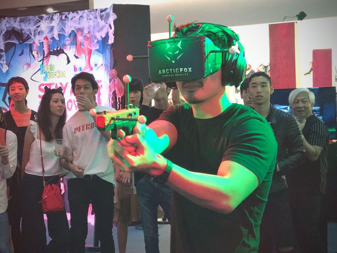 CNET's tweet photo. A wireless headset let me shoot zombies in a mall in VR https://t.co/InGKVIWEQl https://t.co/uepFEZ2GQ0