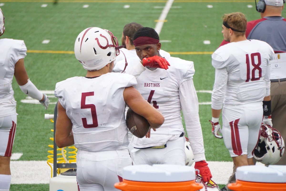 Huskerdogg's tweet photo. Cloyd & Johnson strategizing on the sidelines! 11:01 4Qt Broncos lead 20-12. #CodeRed #HastingsBroncos #5Cloyd https://t.co/JYonjnRZz3
