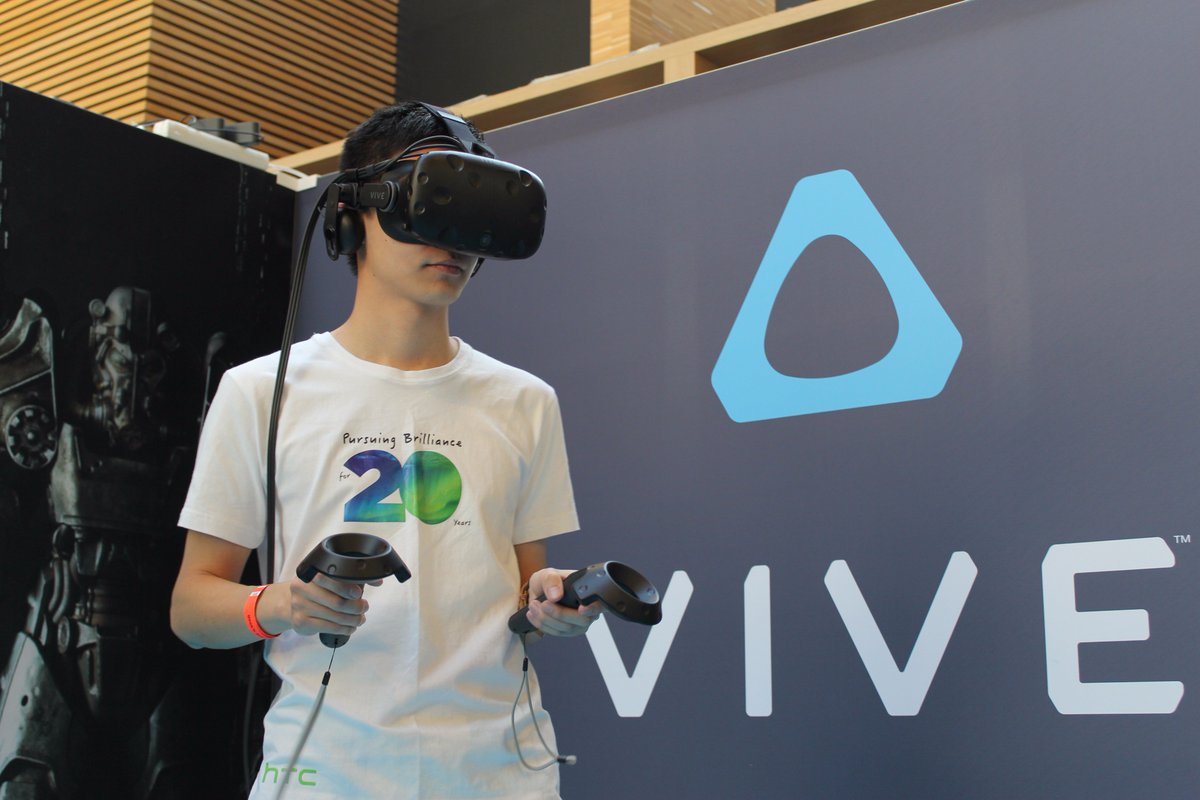 Alpertcr7's tweet photo. Enjoying #HTCvive! Me, Hangxiao, & @mister_htc at @htcvive stand in #Geekslive2017 ! @CherWang @AGraylin @shen @NadiaElharradi @htcbro https://t.co/LysR2iW7cH