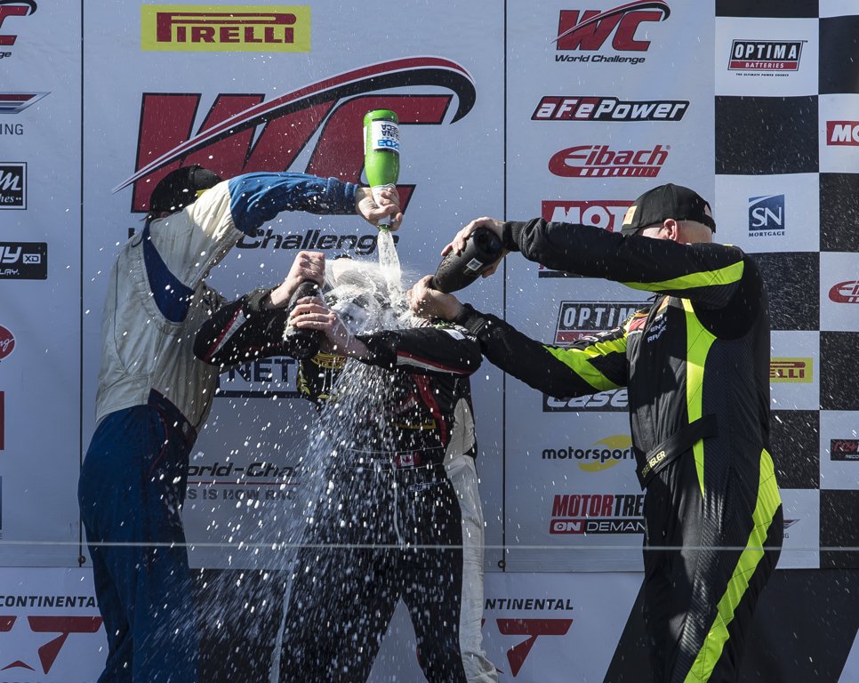 WeatherTechRcwy's tweet photo. TCB winner and newly crowned @WCRacing champion @PJGroenkeRacing gets doused with champagne on the podium. #PWCMRLS
📷: @Strike3photos https://t.co/HAsK79DBiO