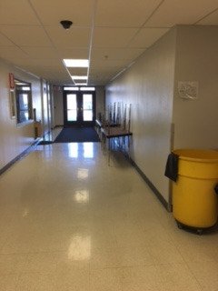 KellyMcGovern2's tweet photo. Tables are blocking the corridor. Hallways should be free from clutter and not used to store materials. #NoTripHazzardsAllowed #EDLD657 https://t.co/7pFcLnXVK3
