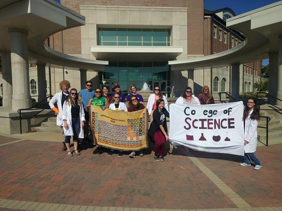 SIUC_Science's tweet photo. #SIUhomecoming parade was awesome! A College of Mad Sciencetist! Lab coats and all! @SIUC #runwithus #godawgs #salukis #thisissiu https://t.co/5XTaYH1KU8