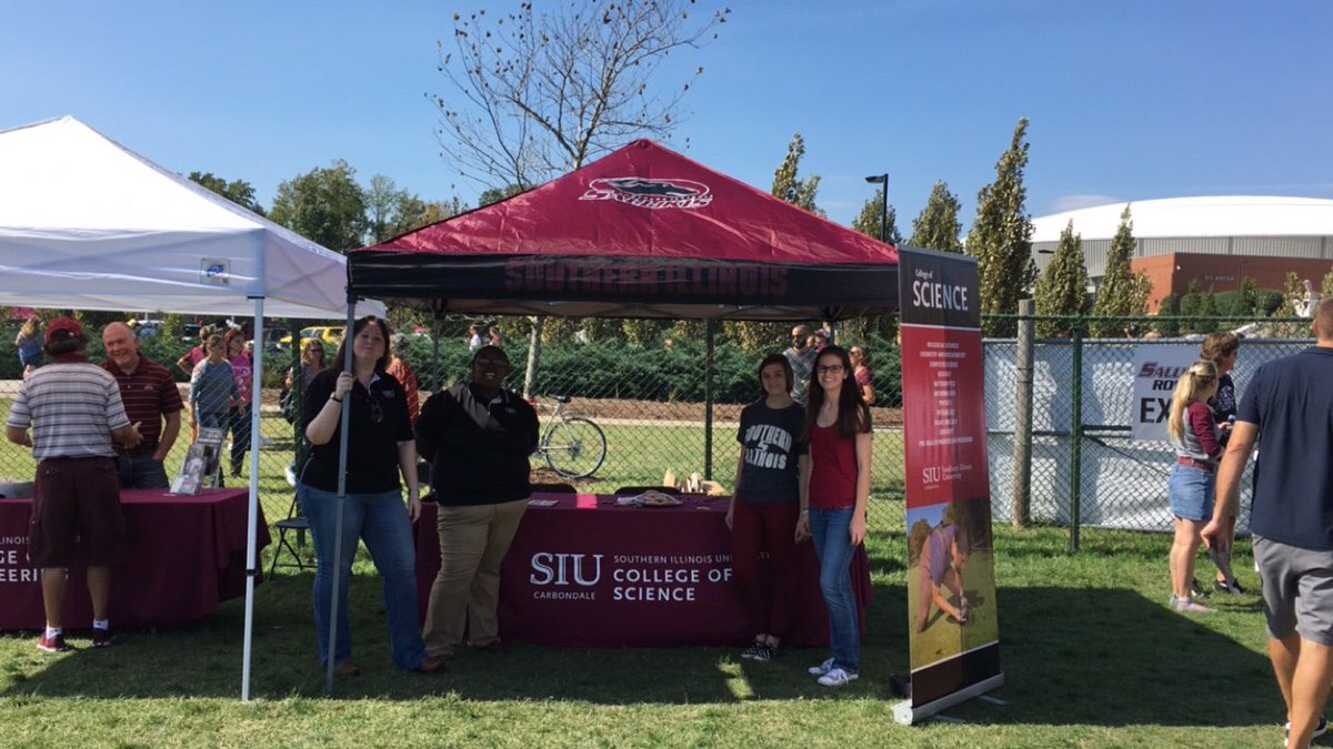 SIUC_Science's tweet photo. #SIUhomecoming parade was awesome! A College of Mad Sciencetist! Lab coats and all! @SIUC #runwithus #godawgs #salukis #thisissiu https://t.co/5XTaYH1KU8