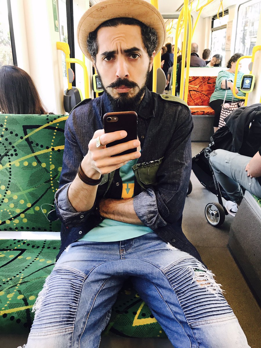 nedaworld_'s tweet photo. On the way to #fairfaxtheatre an look at This guy on the tram #corkhat #hunk #melbourne @MarrsCoiro https://t.co/RJqk610LjD