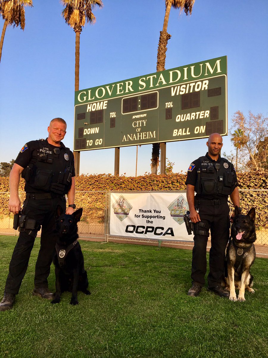 CityOfOrangePD's tweet photo. Orange Police Officers King & Allen alongside their K9's Griffin & Bosco at OCPCA, 29th Annual K-9 Demonstration #ocpca https://t.co/O3uMCD80Eg