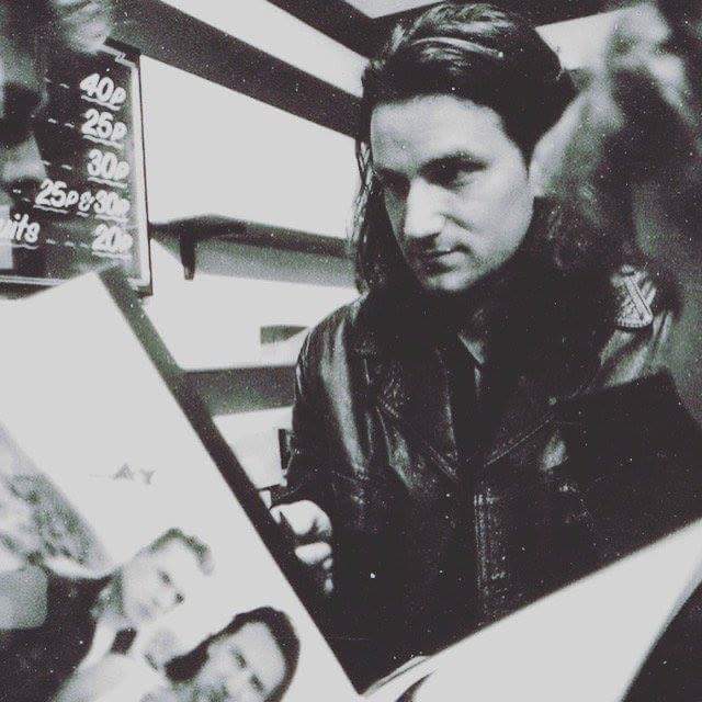 noelgrimleys's tweet photo. Bono at Makin Traks on Castle Lane for the release of #TheJoshuaTree in 1987! (PS just look at the prices!) Pic by #belfasthistoryproject https://t.co/RbYJ7LAAgz