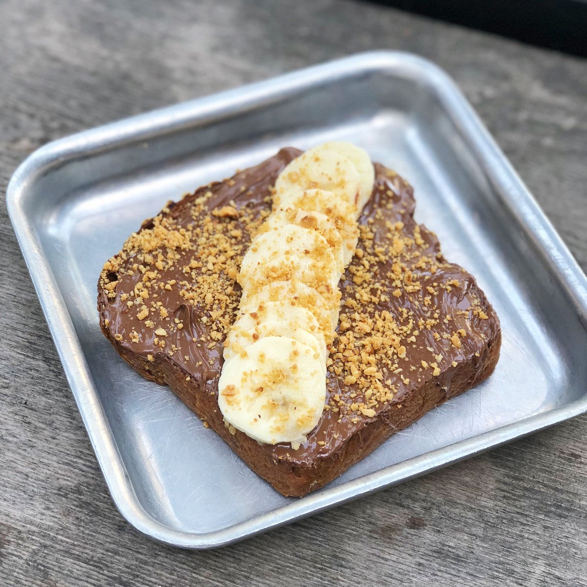 IrenesATX's tweet photo. Our #NutellaToast got a makeover! It now has banana and crushed hazelnuts. Get one at #BiscuitsAndBooze Brunch today starting at 10am! https://t.co/LynRtREOVv