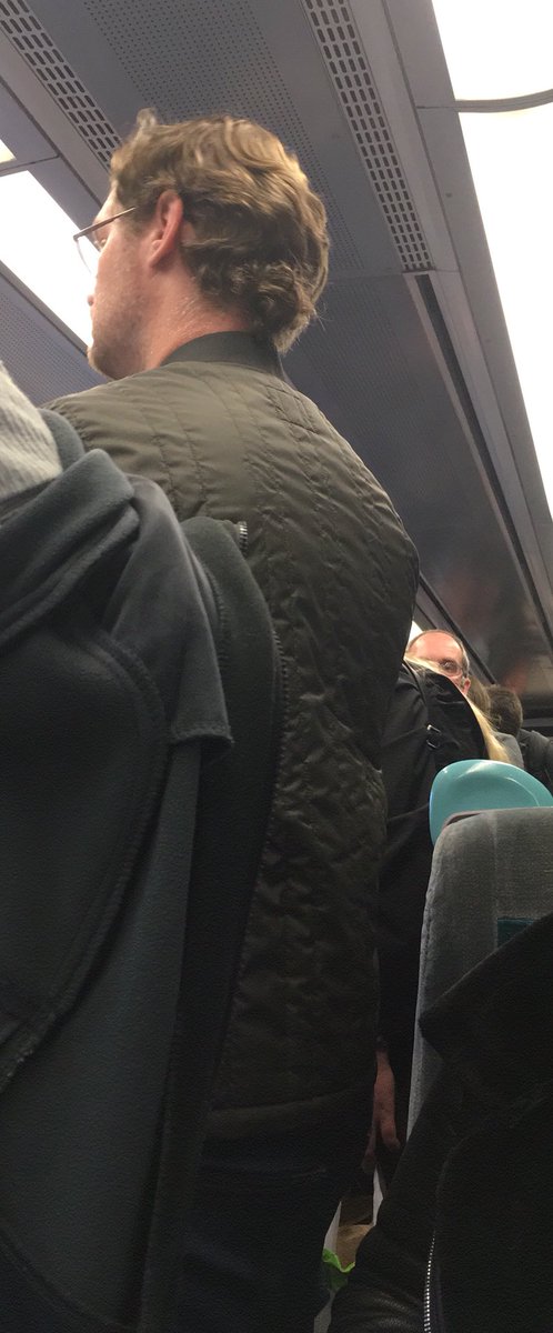 amycrocombe's tweet photo. Great service again by @ArrivaTW 2 carriages which were full at Bangor...this is Rhyl. I’m just wondering how I’m supposed to get off?? https://t.co/B07cThBsZZ