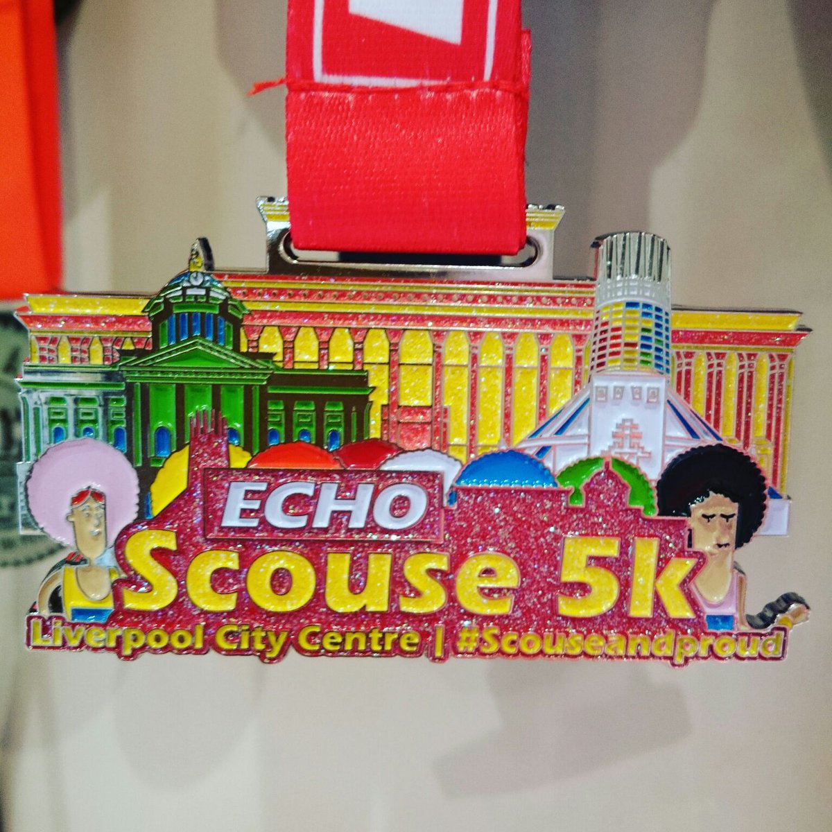 TAFKASB's tweet photo. Mrs SB did the Scouse 5k today. She had to wear a wig that apparently represents scousers. How wacky. Anyway #dogsinwigs https://t.co/WOilAQhaOT