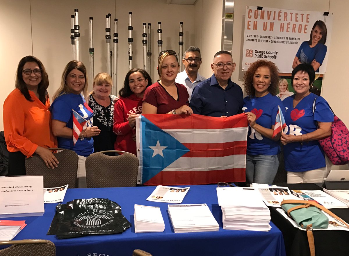 JohannaForFL's tweet photo. OCPS teachers, Wendy Doromal and Javier Melendez at the Orlando International Airport educating Puerto Rican families. https://t.co/01QkNDVZTz