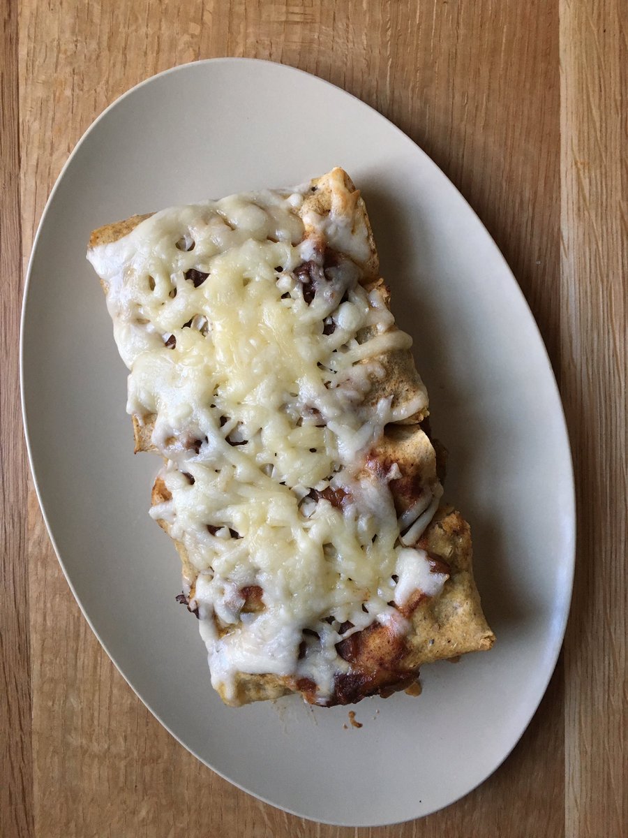 swamprabbitcafe's tweet photo. Dinner tonight: braised beef enchiladas f/ the #swampkitchen! #Local #organic #grassfedbeef, local cheese, gluten-free, delish. https://t.co/l0Rclf7DWo