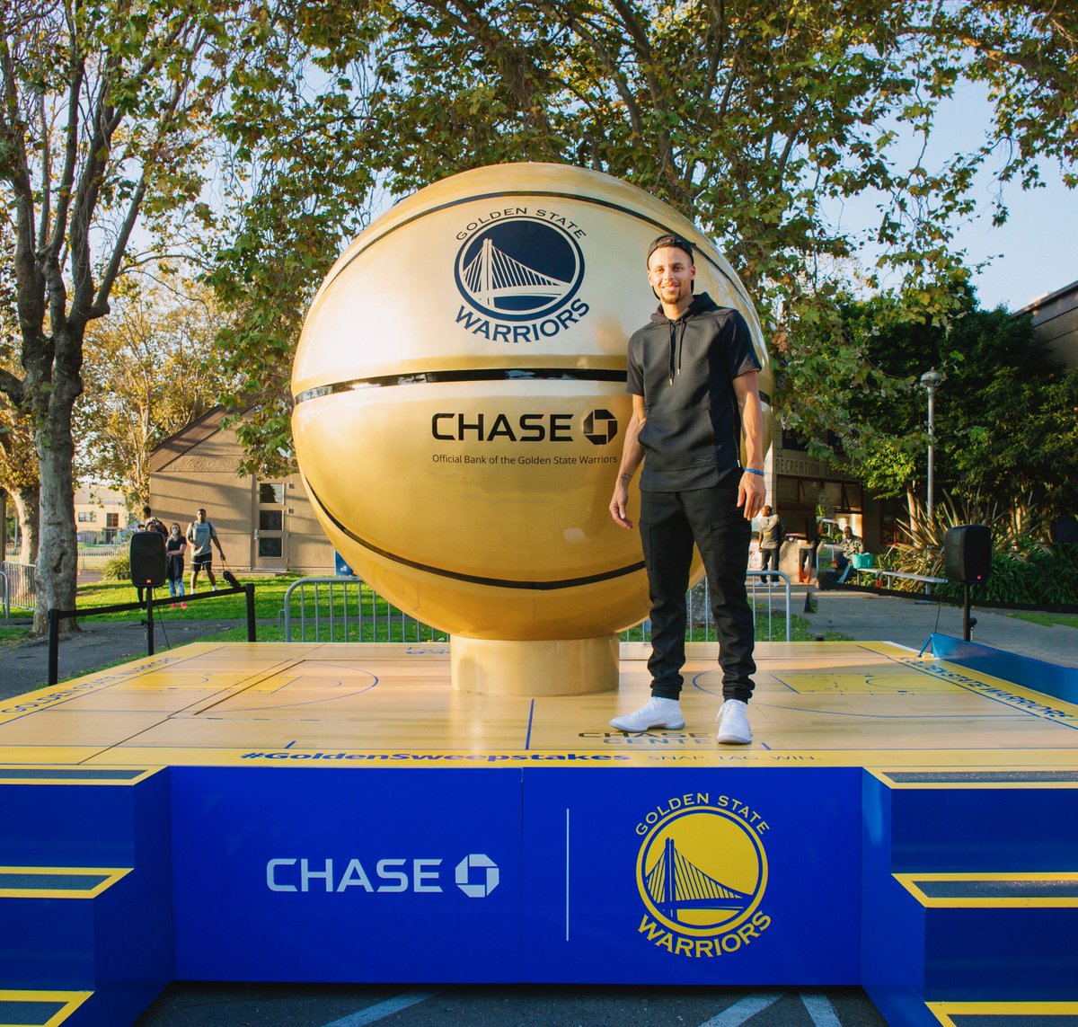 StephenCurry30's tweet image. Finally got to see the @Chase #GoldenVictoryBall in action today during the court refurb at Bushrod Park! Check it out on Opening Night!
