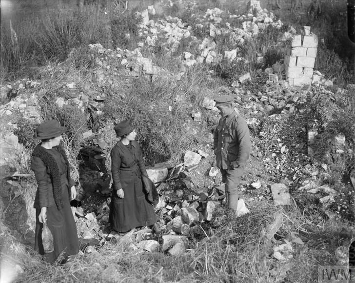 CenturyAgoToday's tweet photo. Two Frenchwomen visit the site of their ruined home in Beaurains: © IWM (Q 6103) https://t.co/kP9fNLPeR5
